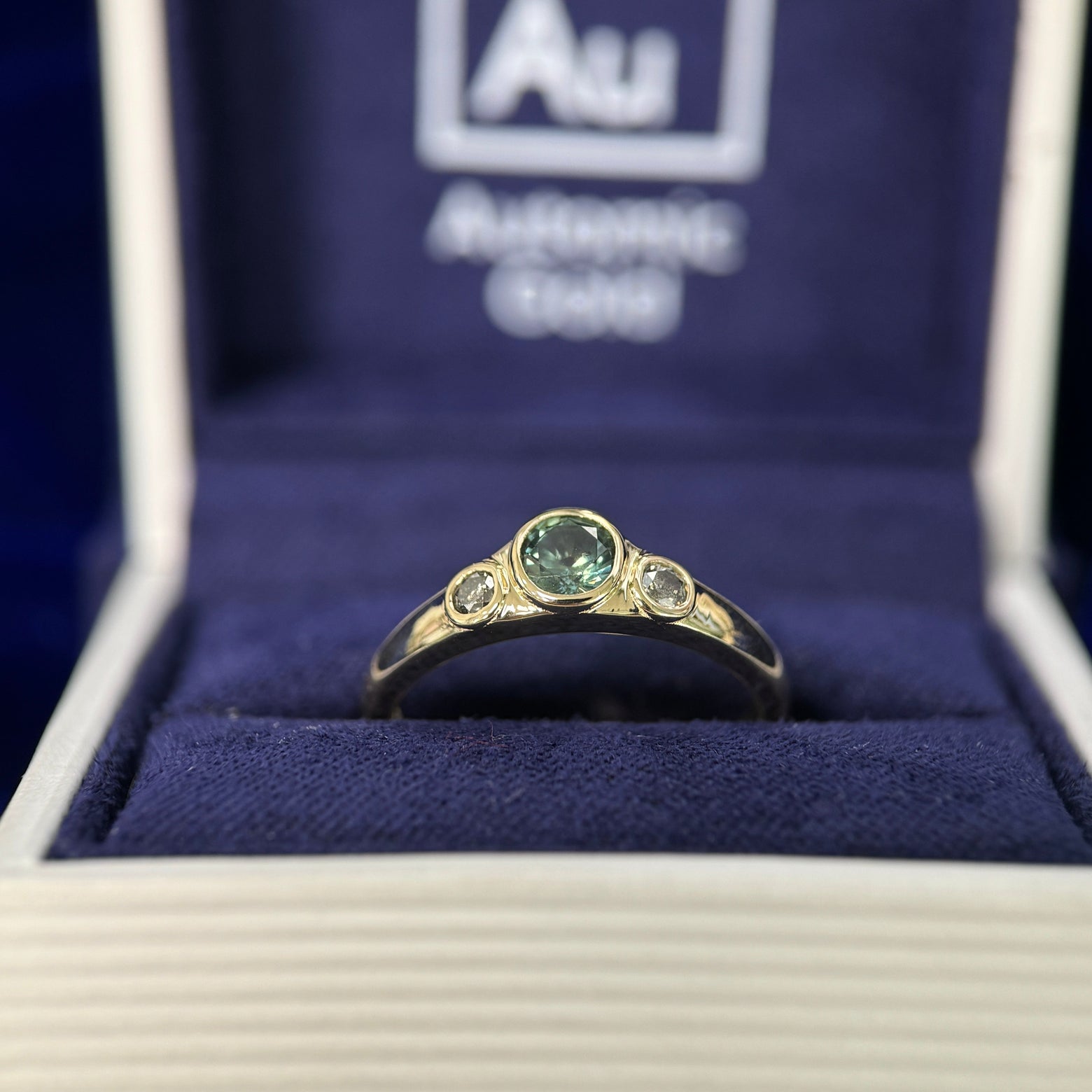 14k Yellow Gold & Bezel-low-set 0.45ct Round Teal Sapphire & 2.5mm Salt-and-pepper Diamonds on Tapered One-side-flat Band 3-stone Custom Ring, size 6.75