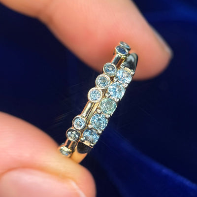 14k Yellow Gold & 0.34ctw Pave-low-in-metal-set 5 Teal Sapphires Tapered 2.5mm Band Custom Ring and 14k Yellow Gold Asymmetrical Spaced-out Bezel-set 8pc Teal Sapphires All around on thin Band Custom Ring, size 7