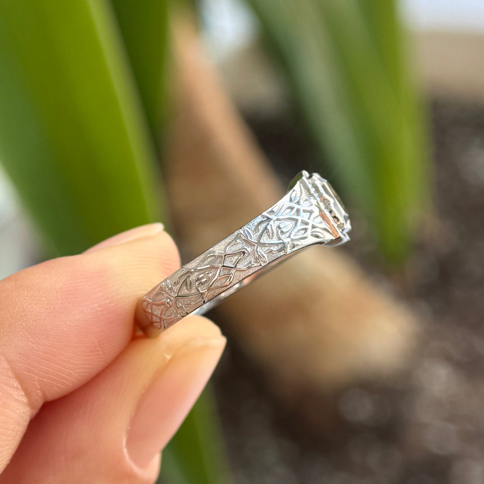 side view of 14k White Gold and 1ct Kosnar Yellow-blue Fantasy Cut Bicolor Clover Shaped Sapphire with 4pc Diamonds on Thick Tapered Thorns Engraved Band Custom Signet Ring, size 8.5
