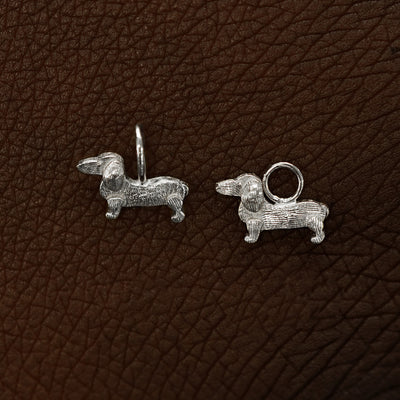 Two 14 karat White solid gold Dog Charms shown in the For Chain and For Earring options