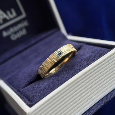 14k Yellow Gold and Flush-horizontal-set 3x2mm Teal Baguette on 4mm Wood Band Custom Ring, size 6.75