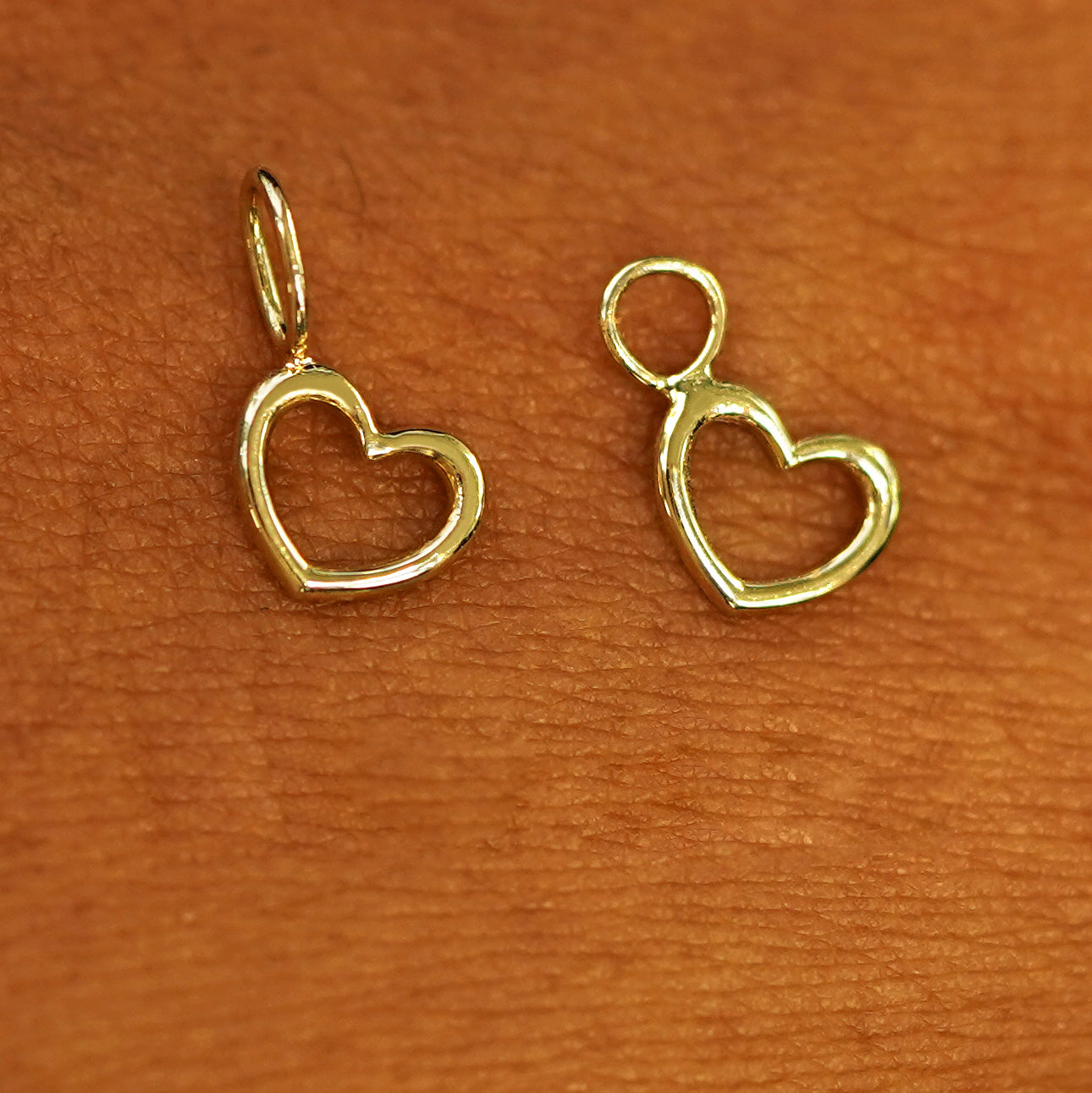 Two 14 karat  Yellow solid gold Heart Charms shown in the For Chain and For Earring options