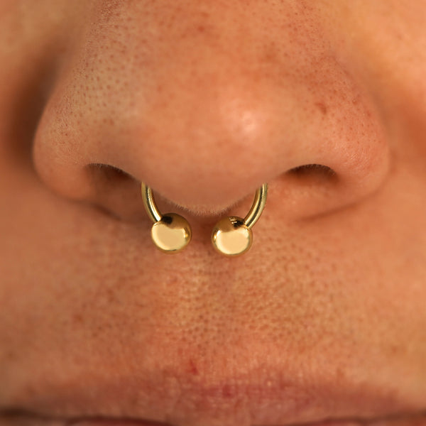 low curved septum retainer
