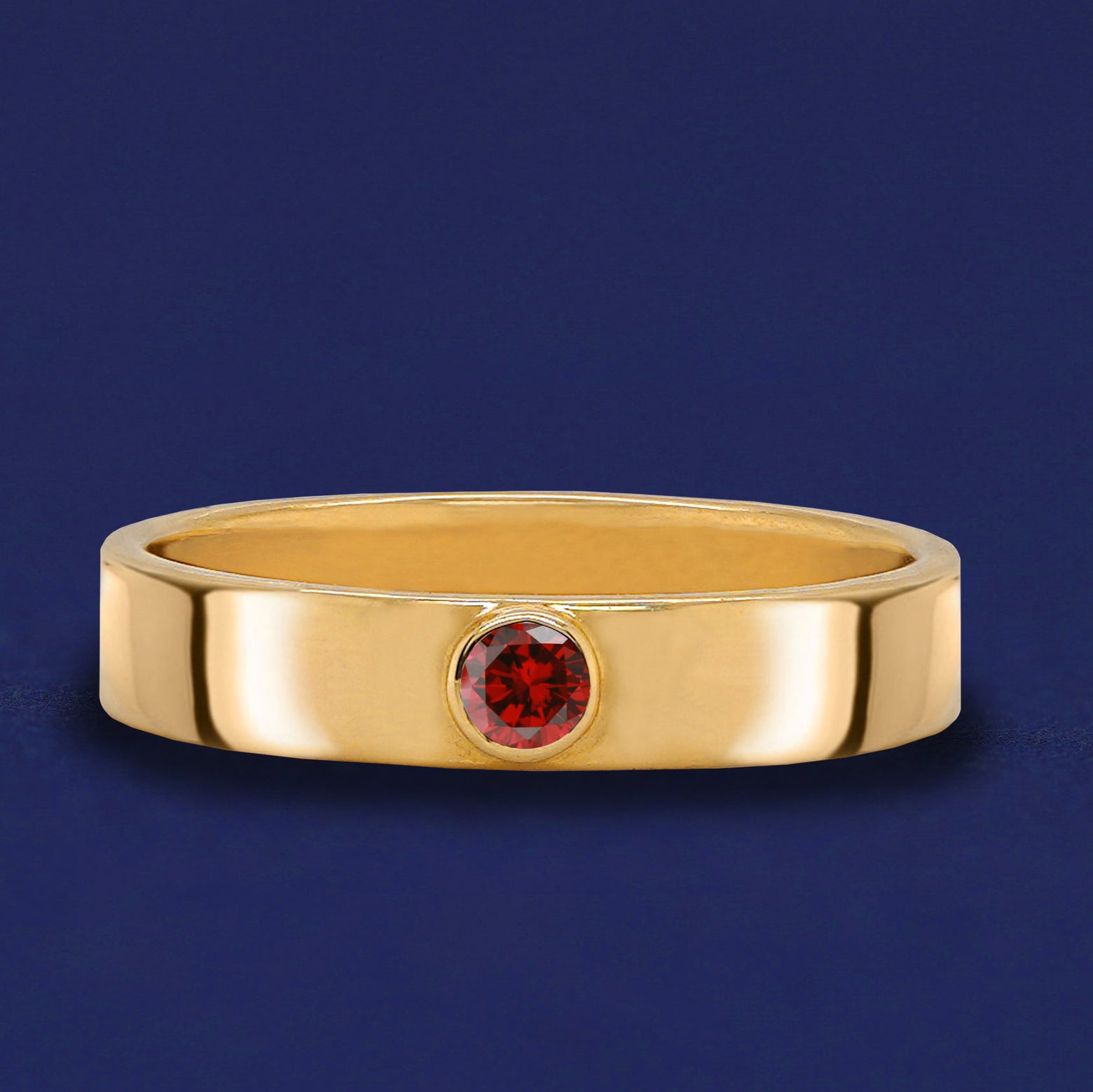 A solid yellow gold january birthstone Garnet Gemstone Industrial ring